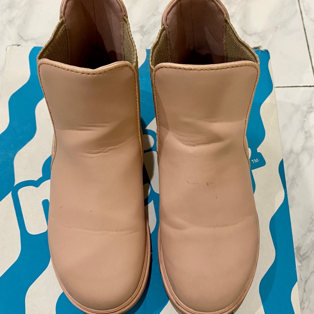 Girls faux leather pull on bootie, lug sole.